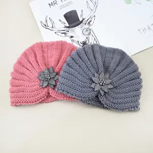 Women winter warm knitted turban hat with rhinestone crystal flower brooch, stylish beanie.