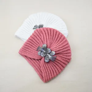 Rhinestone flower knit turban hat, cozy winter warm beanie, elegant crystal head wrap detail.