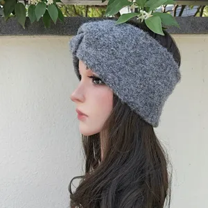 Grey faux wool knitted wide headband, cross design detail for warm ear protection, chic accessory.