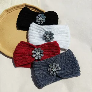 Knitted headband set with sparkling crystal flower details, cozy autumn winter hair accessory.