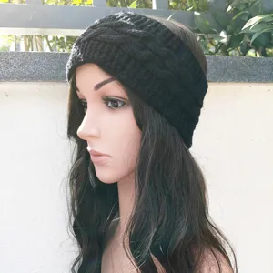 Black knitted braided fleece-lined headband, winter warm hair accessory detail view.