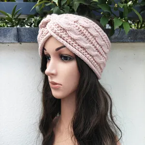 Pink knitted headband detail view, cozy winter ear warmer accessory for daily wear style.
