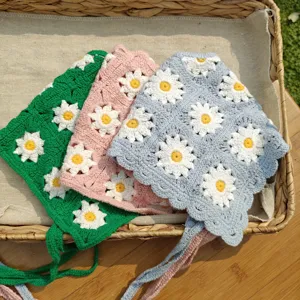 Handmade crochet daisy headscarf detail, knitted floral hair wrap and cute tie headband.