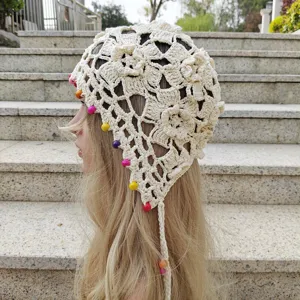 Handmade crochet hollow bonnet cap with colorful beads and tassel braid design for women.