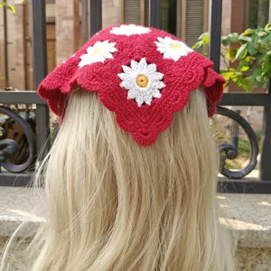 Detailed view of the red crochet daisy headscarf, handmade knitted pastoral hair band style.