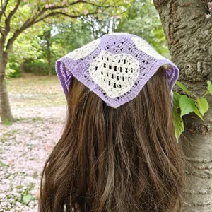 Detailed view of the crochet heart triangle hair scarf, perfect for outdoor spring and summer.