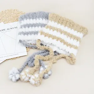 Furry striped warm hat with long ties and pom-poms for women autumn winter cozy fashion.