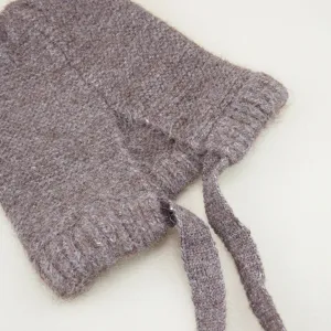 Solid color wool knitted hat with straps, warm pullover beanie for women winter style.