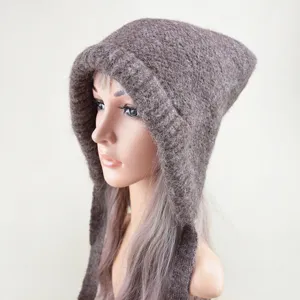 Detailed view of the solid color wool knitted hooded hat with long straps, cozy and warm.