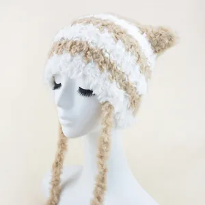 Furry striped knit hat with cute cat ears and long tassels for autumn and winter warmth.
