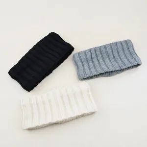 Knitted wide hair band detail view, warm fleece lined winter solid color fashion headwear.