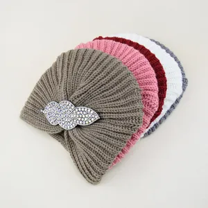 Knitted turban hat for women autumn winter warm beanie cap with sparkling crystal leaf brooch.