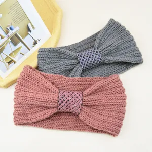 Close-up detail of cozy knit sequin headband, warm winter ribbed hair accessory in dual colors.
