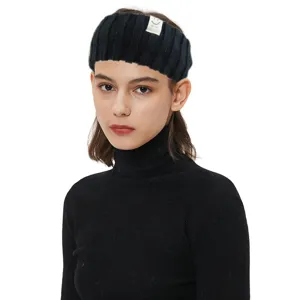 Black knitted headband with smiley face tag, winter warm hair accessory for daily wear.