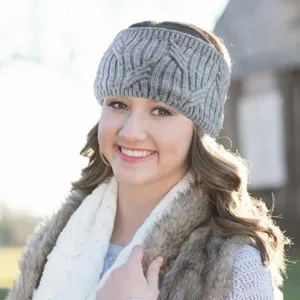 Winter cozy knitted headband for women, thick cable knit ear warmer and stylish hair accessory.