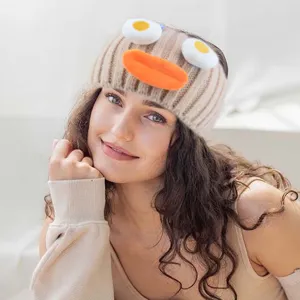 Lustiges Strickstirnband mit großem orangen Mund und Spiegelei-Augen für Damen Alltag.