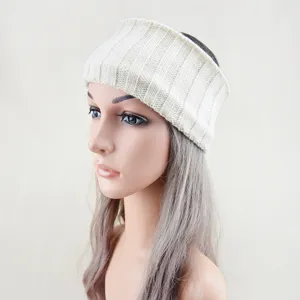 Detailed view of white knitted headband ear warmer, thick ribbed design for winter warmth.