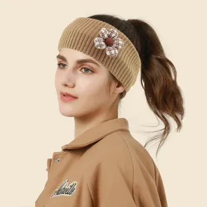 Knitted headband with cute plaid flower, cozy ribbed winter hair accessory for women and girls.