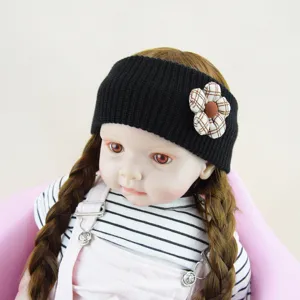 Black knit headband featuring a cute plaid flower detail, warm winter hair accessory for kids.
