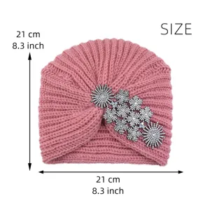 Womens pink knit turban hat with rhinestone flower brooch, warm winter slouchy beanie cap.