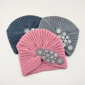 Rhinestone knitted turban detail, warm crystal floral beanie hat for autumn winter fashion.