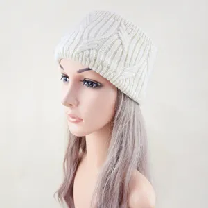 Detailed view of winter knitted wide headband with silver threads and cozy ear warmer design.