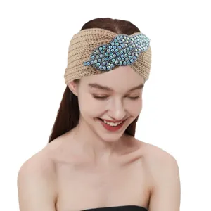 Knitted rhinestone leaf headband for women, chic winter warm hair band and yoga hair accessory.