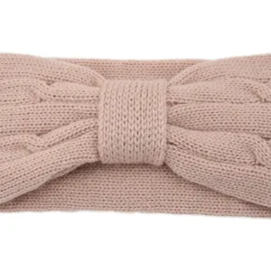 Detailed view of the pink knit headband, showcasing soft cable texture and bowknot design.