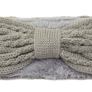 Detailed view of the cozy grey knitted fleece-lined bow headband, showing soft texture.