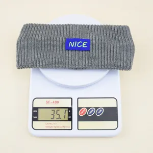 Grey knitted headband with NICE embroidered patch, Y2K style warm winter sports hair accessory.