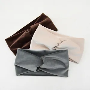 Detailed close-up of soft velvet twisted headbands in multi colors for comfortable daily wear.