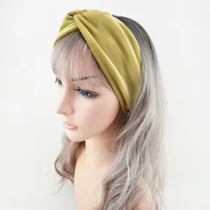 Detail shot of a chartreuse velvet twisted headband, soft wide hair accessory for daily wear.