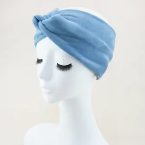 Close up of blue velvet knotted headband, soft wide hair band detail, cozy hair accessory