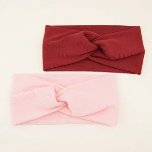 Cross knit striped headband for women, elastic sports yoga hair accessory and wide face washing band.