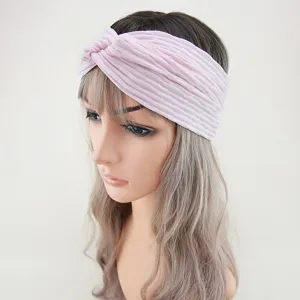 Pink twisted hair band detail, elastic stretch fabric yoga sports headband for daily wear.