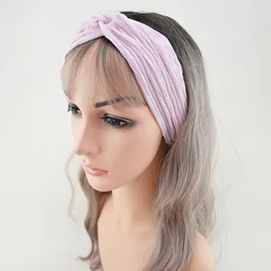 Pink wide twist headband elastic hair accessory for yoga, running and daily washing.