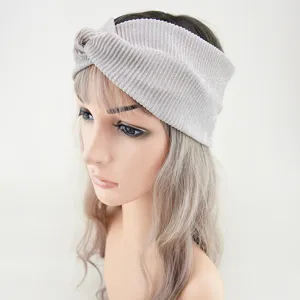 Glitter wide twisted headband for women, stylish elastic silver sparkle accessory.