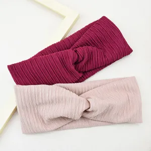 Cross vertical stripe hair band detail shot showing the textured elastic yoga workout headband.
