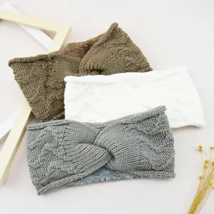 Cozy fleece-lined knit headband with twist design, warm ear warmer for winter outdoor sports.