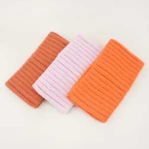 Detailed close-up of ribbed knit hair bands in assorted solid colors for daily wear soft.