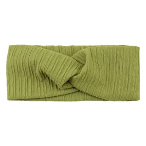 Green ribbed twisted headband for women, elastic sports hair band and yoga hair accessory.