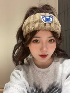 Korean style brown knitted hairband with cute blue bear patch, wide winter daily headwear.