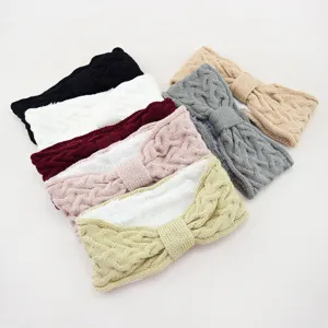 Cozy fleece-lined cable knit bow headbands in various colors for winter warmth and sports.