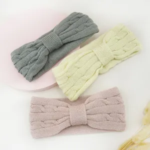 Cozy knit hair band with bow knot design, warm winter hair accessories in three colors.