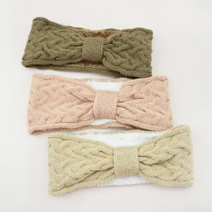 Detailed close-up of thick cable knit fleece lined warm ear warmer headband set multi colors.
