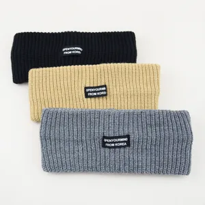 Knitted headband set featuring soft wool material, wide brim, and cute logo label for daily style.