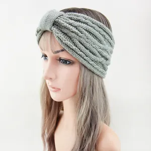 Grey fleece lined knitted headband, winter warm hair band, vintage twist design detail view.
