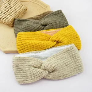 Knitted fleece-lined twist headband warm winter ear warmer hair accessory detail view.