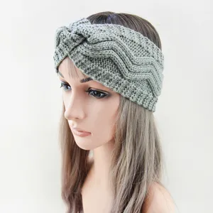 Grey knitted headband with twist wave pattern, warm fleece lined winter hair band.