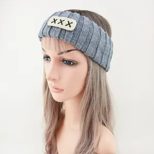 Grey knitted hairband detail view, comfortable wool wide headband accessory for daily wear
